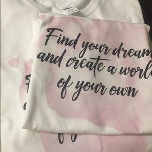 Logo shirts in white, yellow with quote